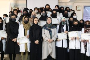 women graduating with medical certification for first aid